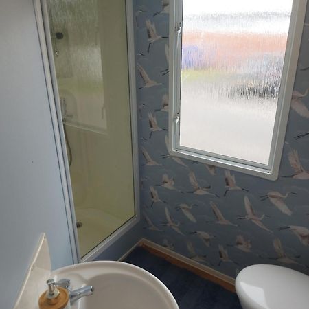 Betty'S Place Hotel Уитли Бей Екстериор снимка
